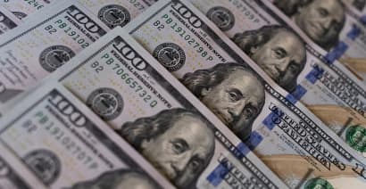 Dollar slips after Fed statement, yen weakens